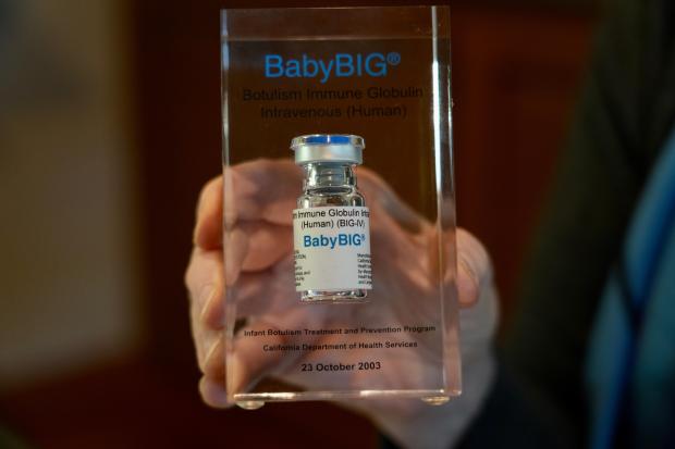 A glass case displaying a vial of BabyBIG, the treatment for infant botulism is shown on Nov. 21, 2025 in Aos Altos, Calif. (AP Photo/Terry Chea)