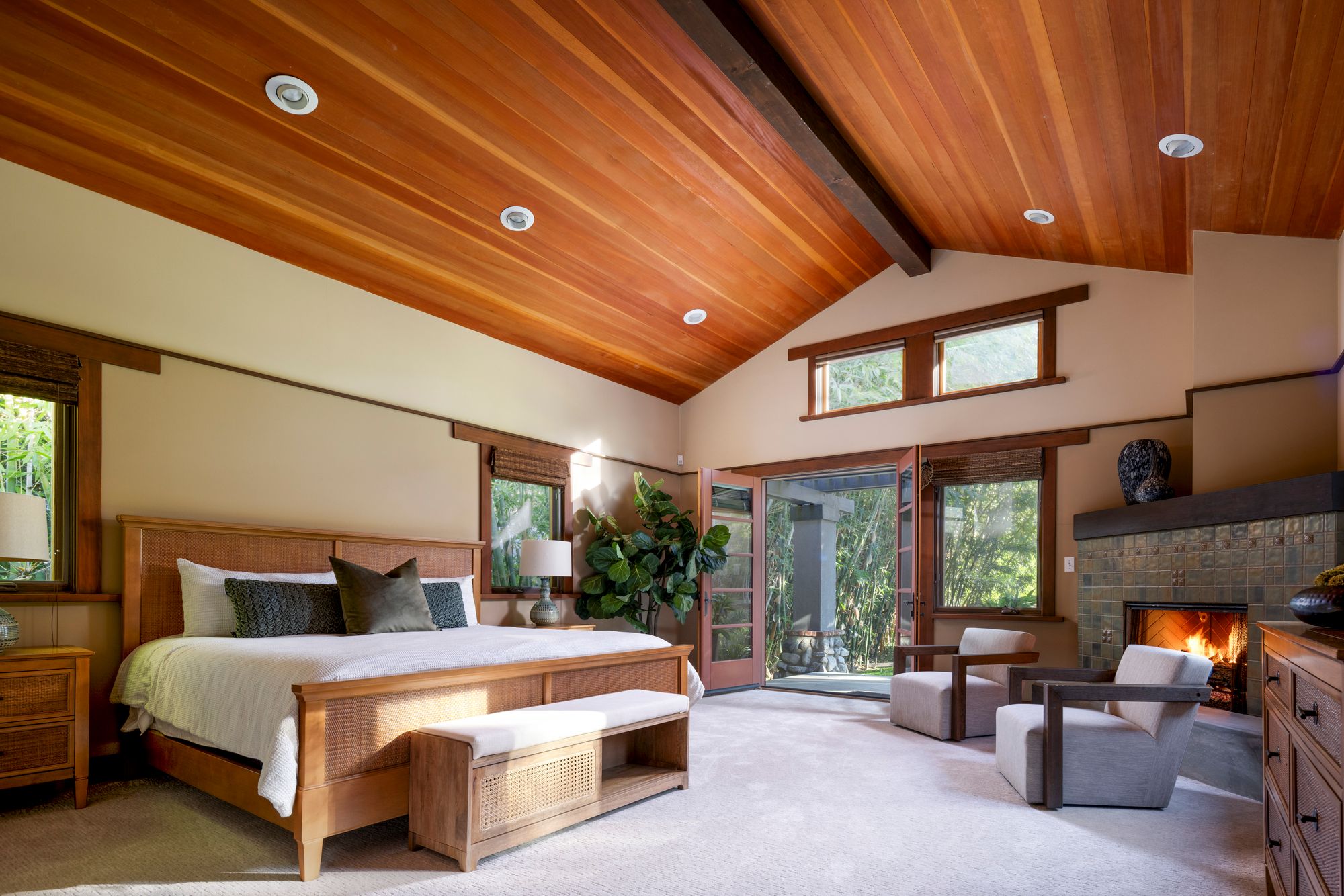 Completed in 2006, the home features an 18-foot beamed great room with a massive stone fireplace and floor-to-ceiling windows overlooking the lake