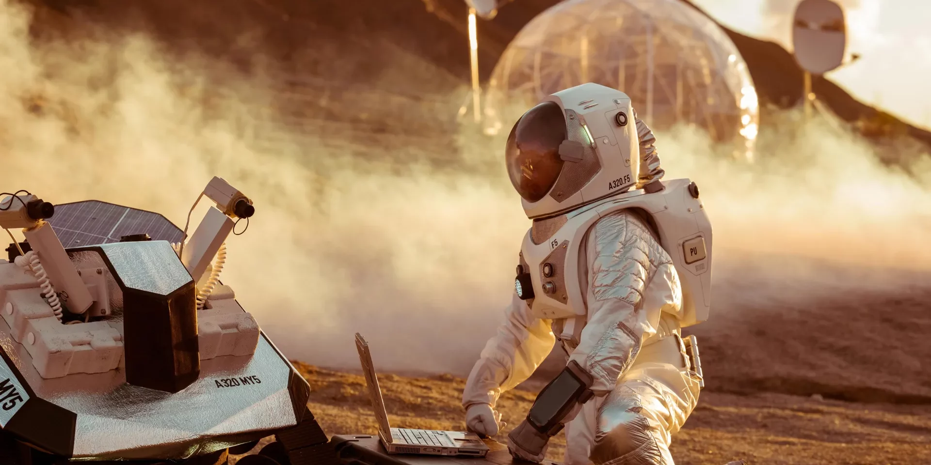 astronaut-space-suit-laptop-on-mars.webp