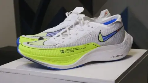 Getty/The Washington Post Pair of Nike Vaporfly trainers in white, bright yellow and blue