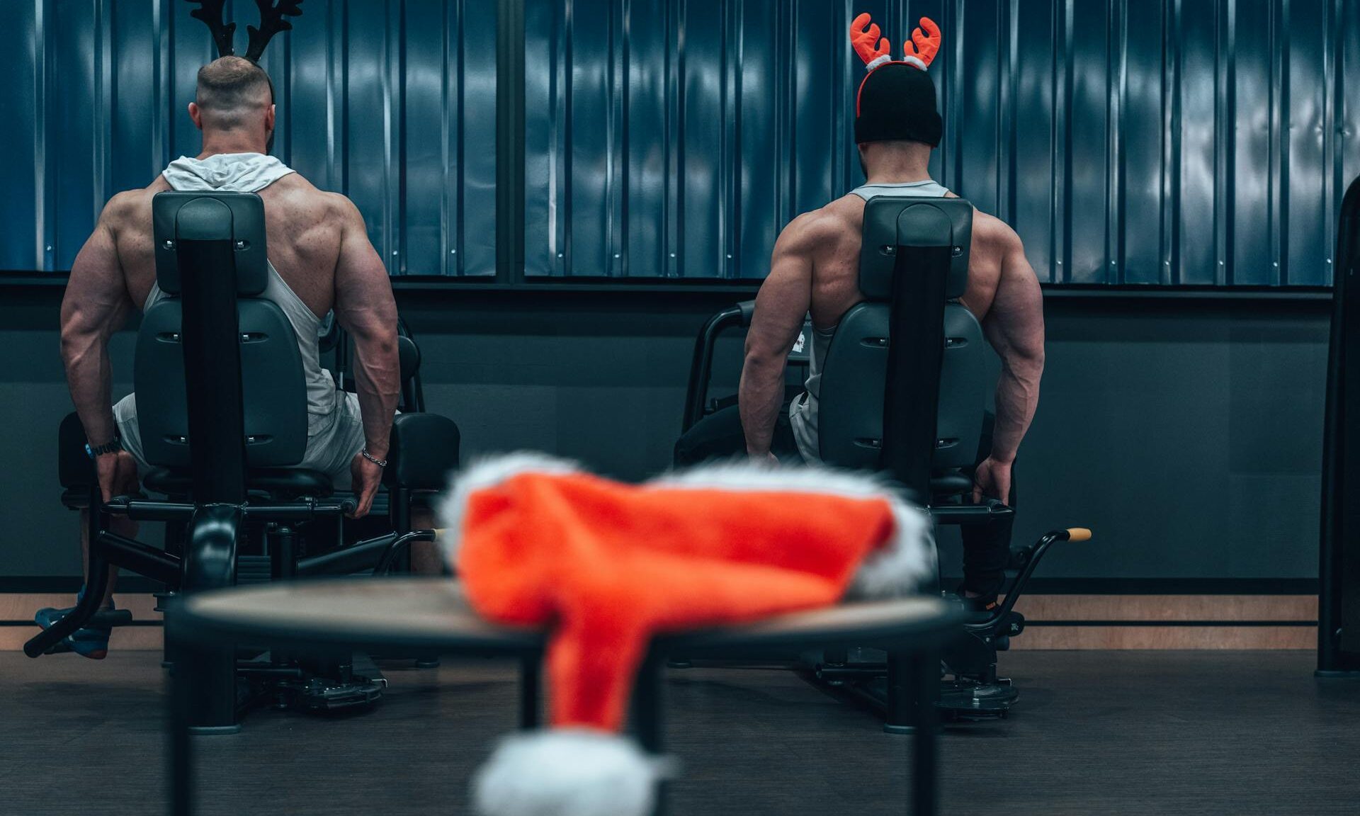 man working out exercise weightlifting with christmas ears