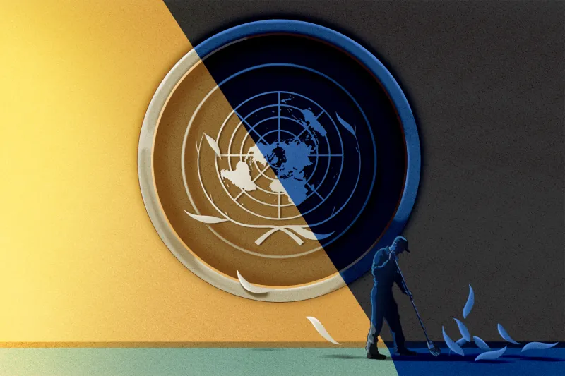 An illustration shows the seal of the United Nations with a shadow across it. Laurel leaves fall onto the ground from the seal as a person sweeps them up.