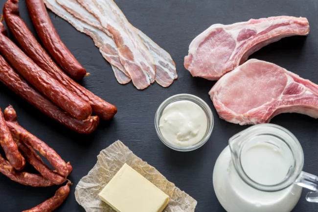 0cd05a74-3c99-4c2c-ac3b-8704966e39bcsaturated fat concept with assortment of meat and dairy products .webp