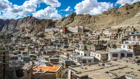 Getty Images Leh is a little town in an elevation of 3500m. high. It used to be the capital of the Himalayan kingdom named Ladakh. Nowadays Leh is the capital in the regional district of Leh in Jammu and Kashmir in India. Leh is an important center for the mountainous area of India. Nowadays it attracts many tourists around the world, mostly those who are involved with mountain sport activities. In Leh there are 4 major religions, Buddhism, Hinduism, Islam and Sikhism.