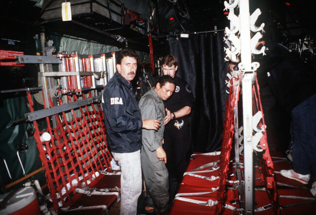 Manuel_Noriega_with_agents_from_the_U.S._DEA.jpg