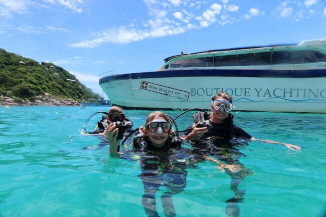 family-divers-in-front-of-the-m.jpeg