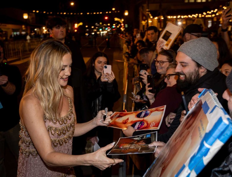 Kate Hudson greets fans outside the Arlington Theatre.