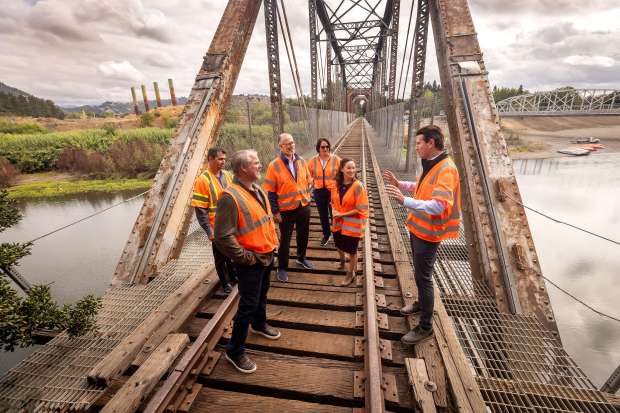 From left, SMART General Manager Eddy Cumins, Supervisor James Gore,...