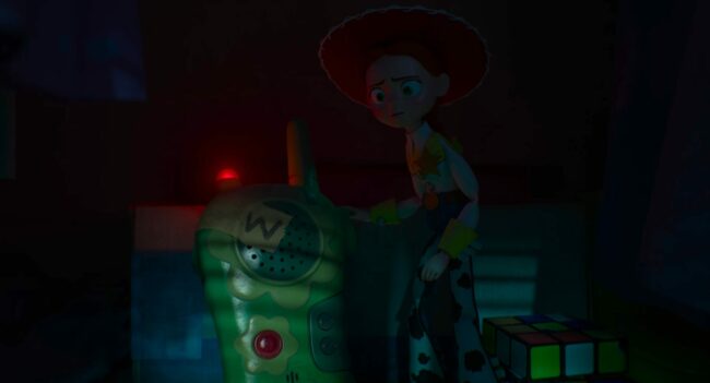 Jessie-looking-concerned-next-to-a-walkie-talkie-in-Toy-Story-5-scaled.jpg