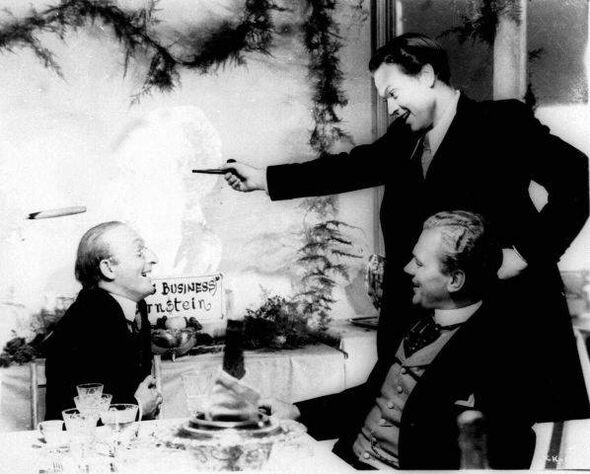 Orson Welles, right, is shown in character in a scene from Citizen Kane