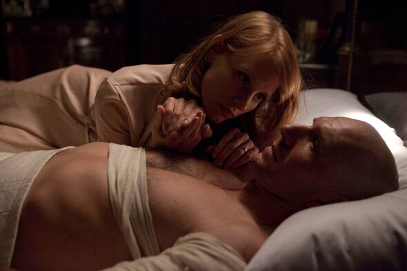 ralph fiennes lies on bed in a bandage ralph fiennes lies on bed in a bandage