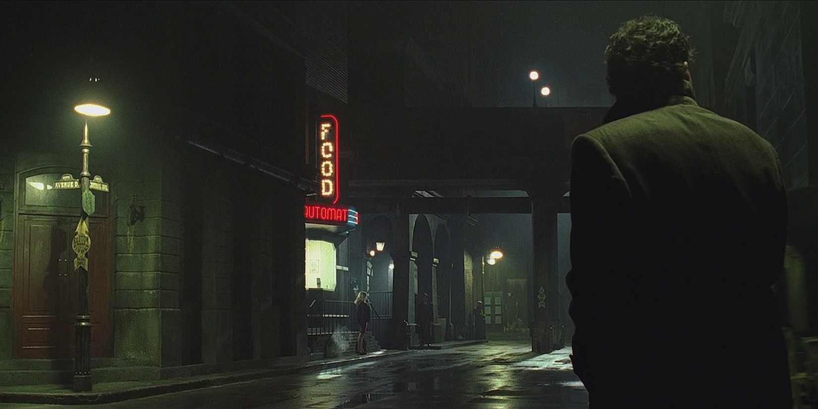 A man walking down a dark, empty street in Dark City