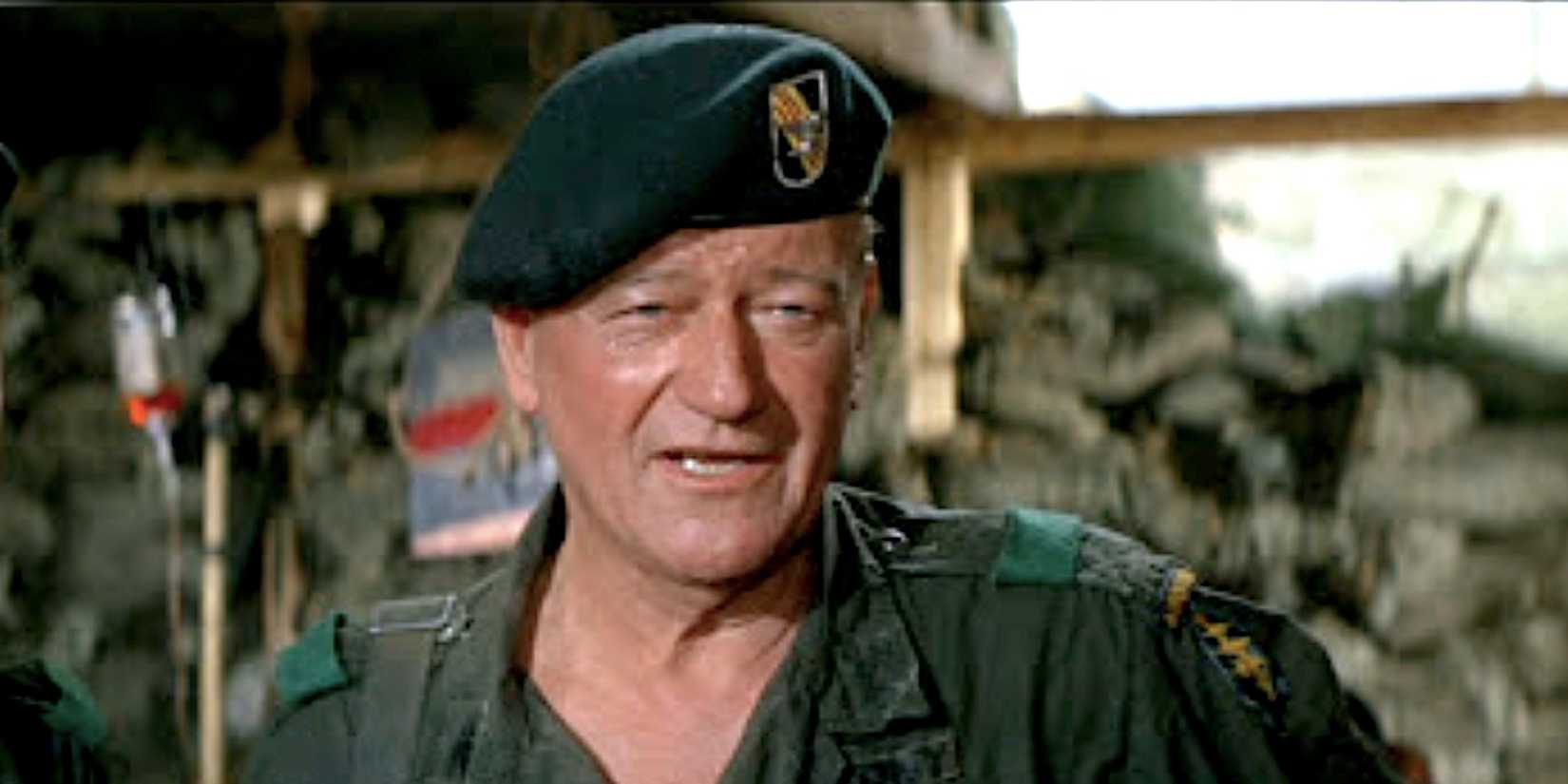 John Wayne's Colonel Mike Kirby smiles in The Green Berets