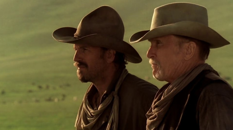 Kevin Costner as Charley and Robert Duvall as Boss, surveying trouble in Open Range