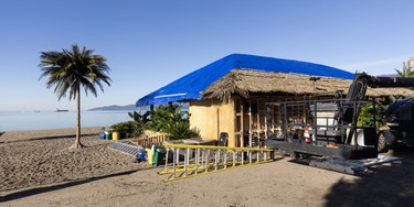 A movie set complete with palm trees at Vancouver's English Bay on Nov. 4, 2025.