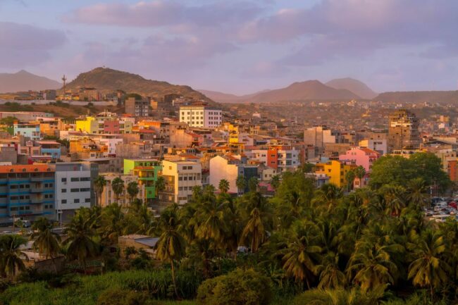 0_The-neighborhoods-of-Praia-the-capital-of-Cabo-Verde-with-the-multi-colored-buildings-and-hilly-landscape.jpg