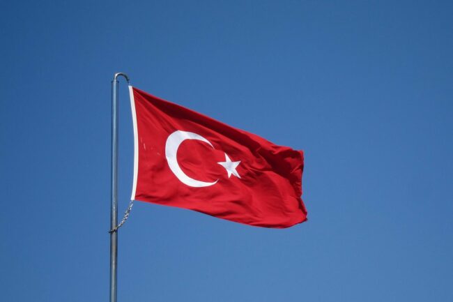 0_Turkish-Flag-Waving-against-Blue-Sky.jpg