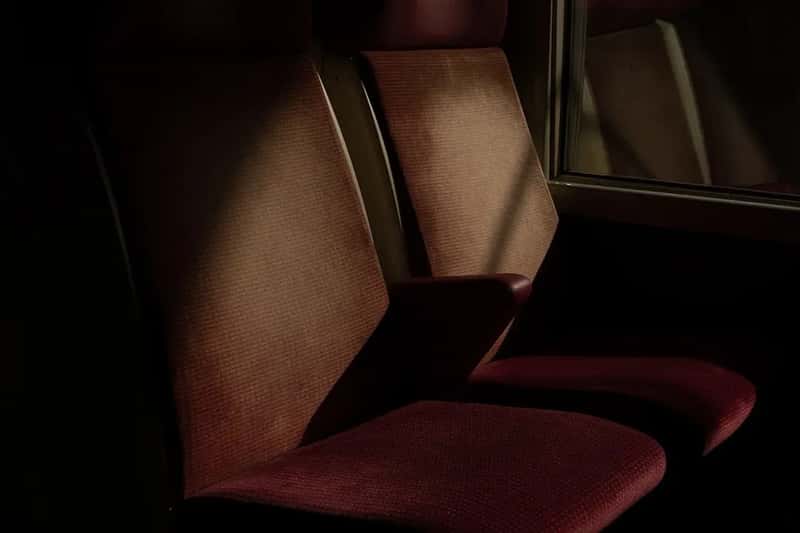 8. Putting Feet Up on Seats (Image Credits: Unsplash)