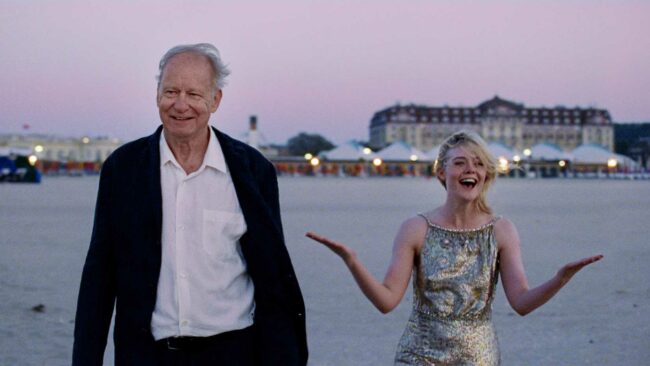 stellan-skarsg-rd-and-elle-fanning-looking-happy-on-a-beach-in-sentimental-value.jpg