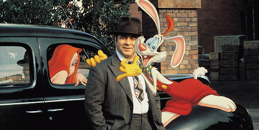 Roger Rabbit hugs Bob Hoskins, and Jessica Rabbit  sits in the car behind them in Who Framed Roger Rabbit 