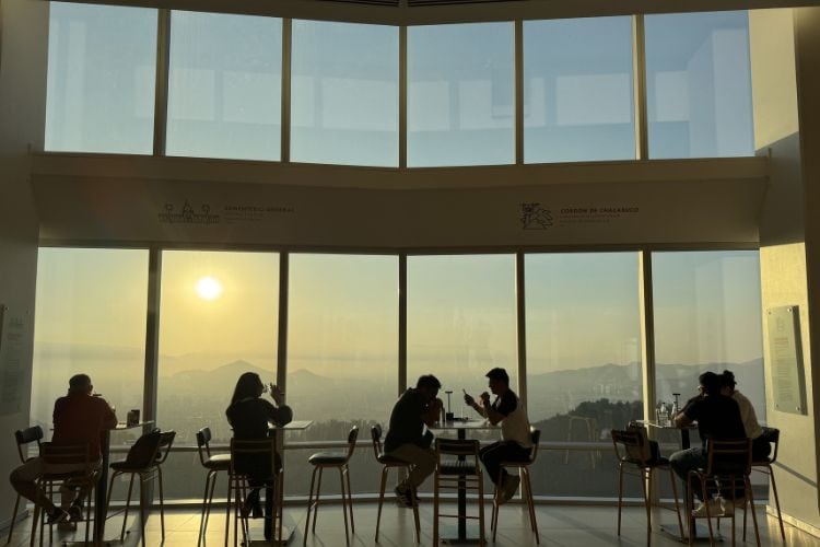 Locals enjoy happy hour with a sunset view at Sky Costanera, South America's tallest skyscraper