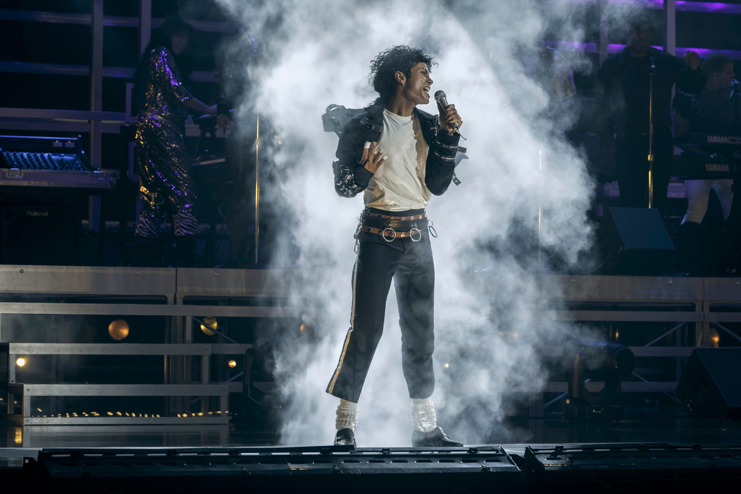 Jafaar Jackson singing on stage as Michael Jackson in the 2026 Lionsgate film, Michael.