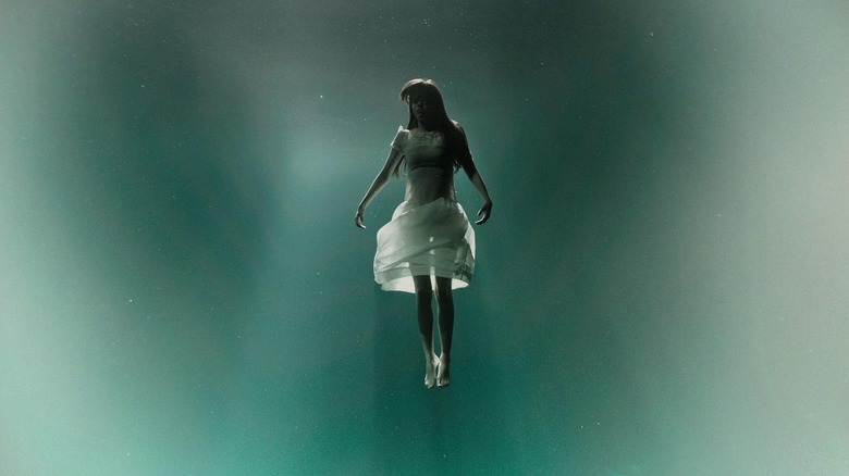 Mia Goth as Hannah von Reichmerl floating ethereally in A Cure for Wellness