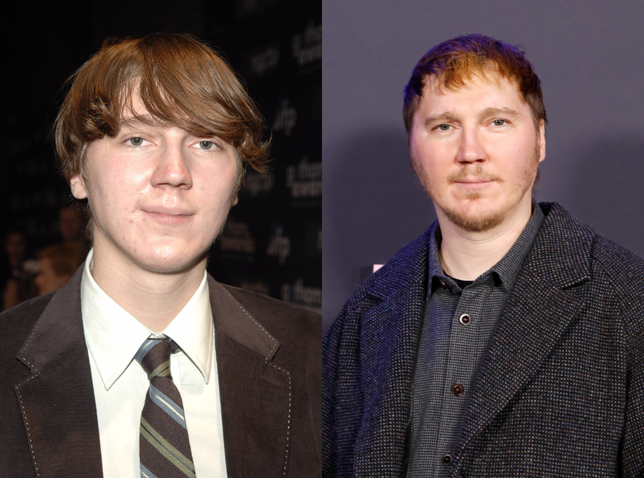 Split image of Paul Dano. On the left in a brown suede suit jacket, white shirt and striped tie smiling at the camera. On the right, in a textured black jacket, dark grey shirt and shorter hair.