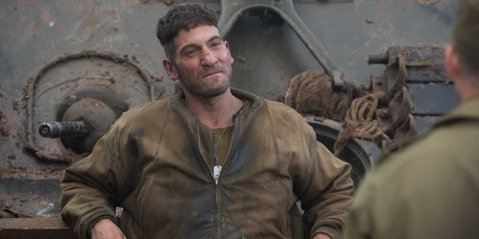Jon Bernthal leaning on a tank in Fury.