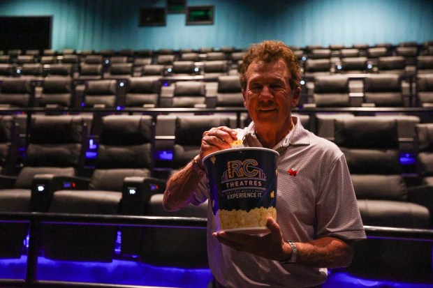 Joe Amato, co-owner of RC Movies 14, stands in front of the new reclining and heated seats at RC Movies 14 on Tuesday, Sept. 8, 2026. (JASON ARDAN / STAFF PHOTOGRAPHER)