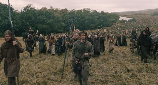 This image released by Focus Features shows Andrew Garfield, center,...