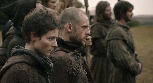 This image released by Focus Features shows Thomasin McKenzie, left,...