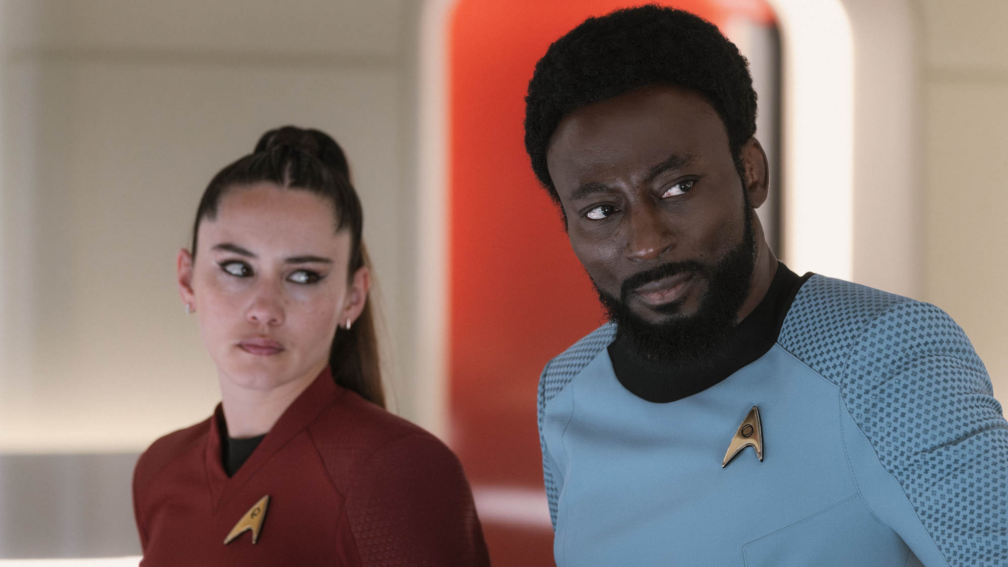 (L-R): Christina Chong as La&rsquo;an Noonien-Singh and Babs Olusanmokun as Dr. M&rsquo;Benga in Star Trek: Strange New Worlds, episode 8, season 4