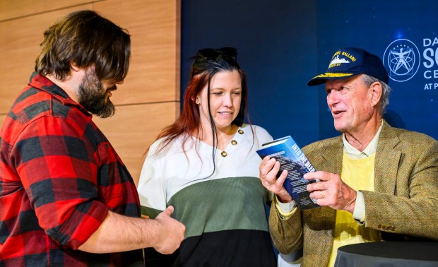 Robert Ballard, best known for his discovery of the RMS Titanic, meets Danielle and Ben Yenser on Tuesday, Sept. 29, 2026, after speaking to Allentown School District fifth graders and community members at Da Vinci Science Center at PPL Pavilion. The 