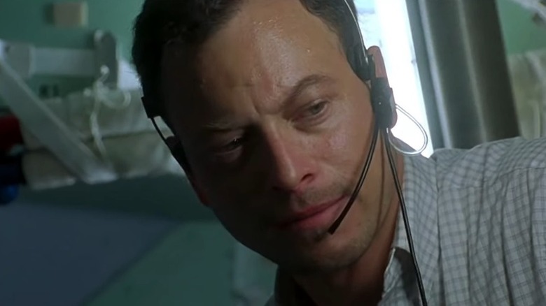 Ken Mattingly wearing a headset and looking serious in Apollo 13