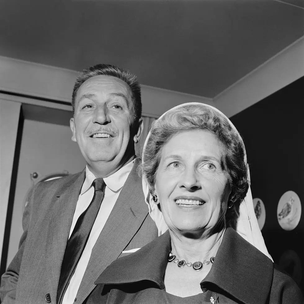 Walt Disney smiling with Lillian Disney in 1957. (Getty Images)