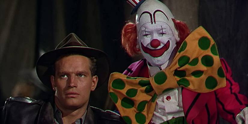 Brad Braden and a clown, standing side by side in The Greatest Show on Earth