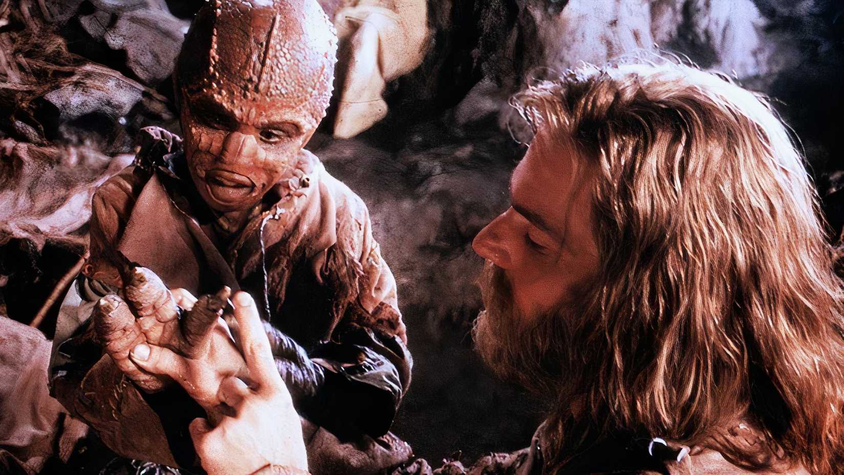 Dennis Quaid banters with an alien in the film Enemy Mine