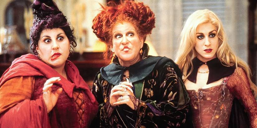 Kathy Najimy, Bette Midler, and Sarah Jessica Parker as the Sanderson Sisters look ahead in Hocus Pocus