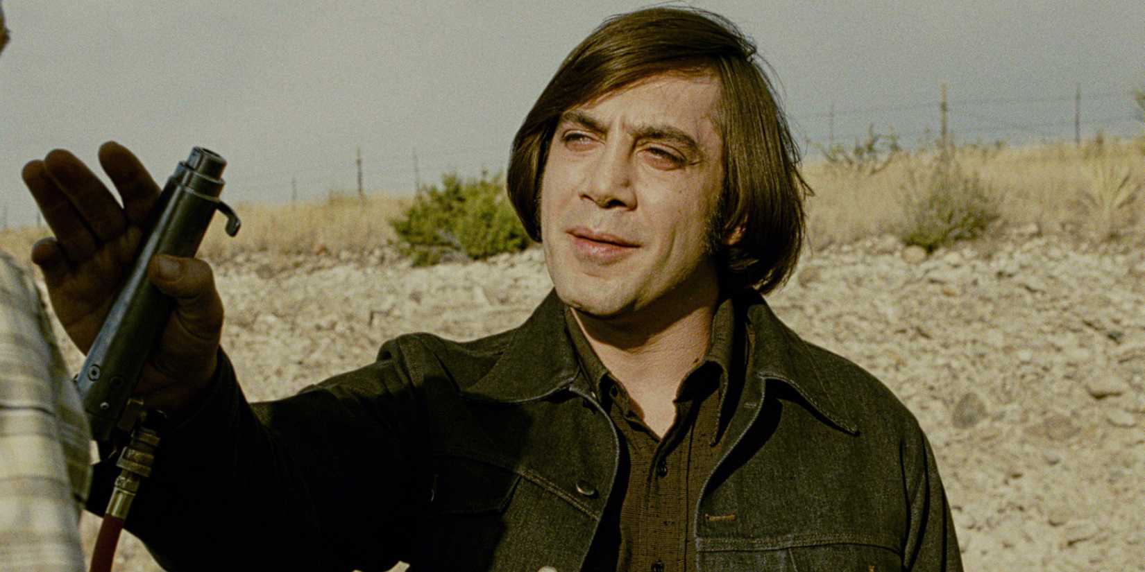 Javier Bardem looking scary in No Country for Old Men