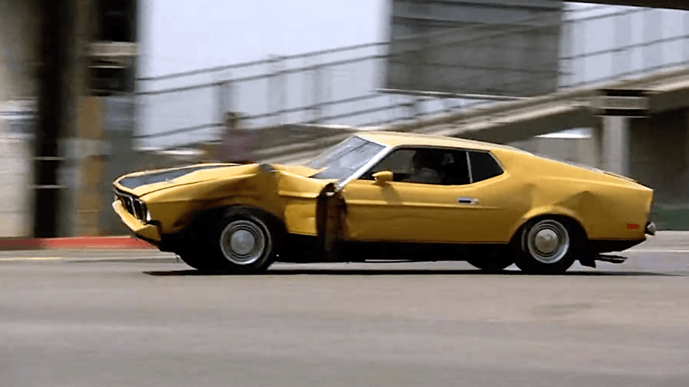 The yellow 1971 Ford Mustang Sportsroof, famously known as