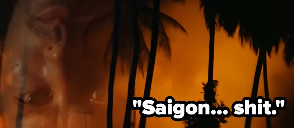 An upside-down close-up of a man's face overlapping a fiery sky with palm trees silhouetted in the background. Text reads, 